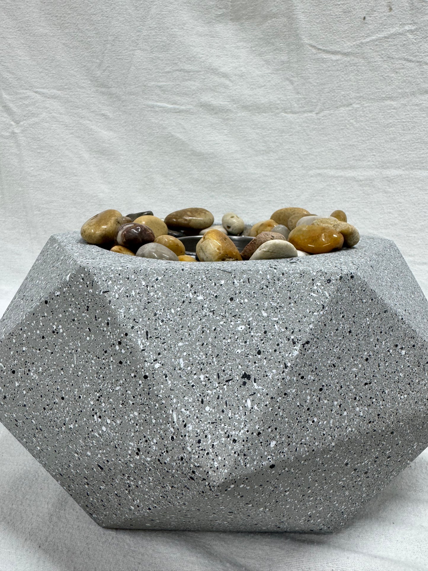 Brand new in box.  Modern Geometric Fire Pit.