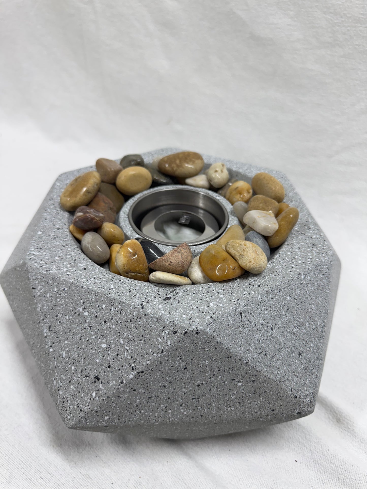 Brand new in box.  Modern Geometric Fire Pit.