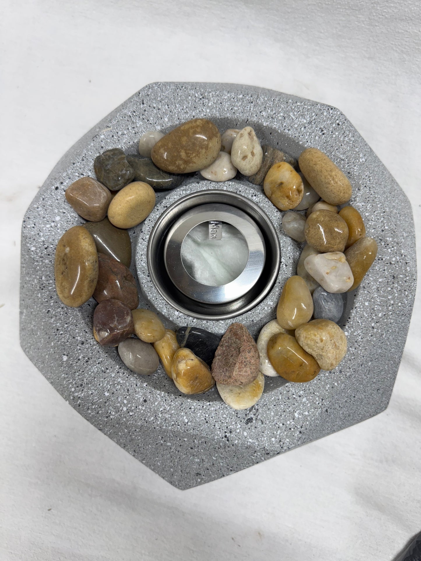 Brand new in box.  Modern Geometric Fire Pit.