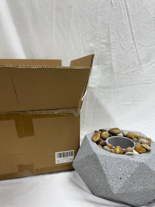 Brand new in box.  Modern Geometric Fire Pit.
